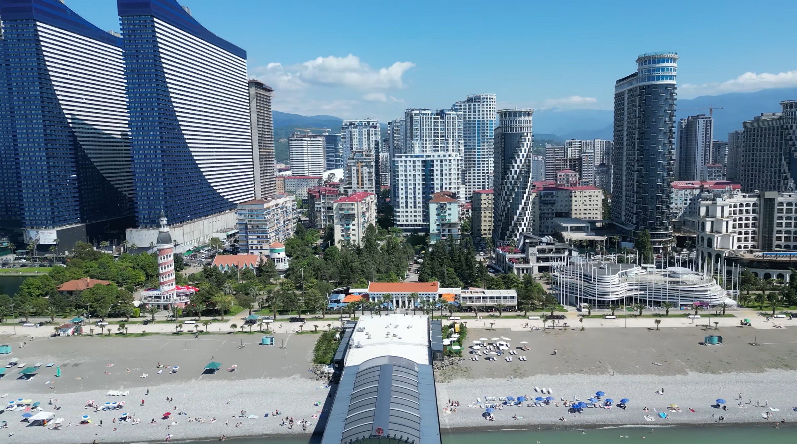 Batumi seafront in summer with branded apart-hotels and rental apartments